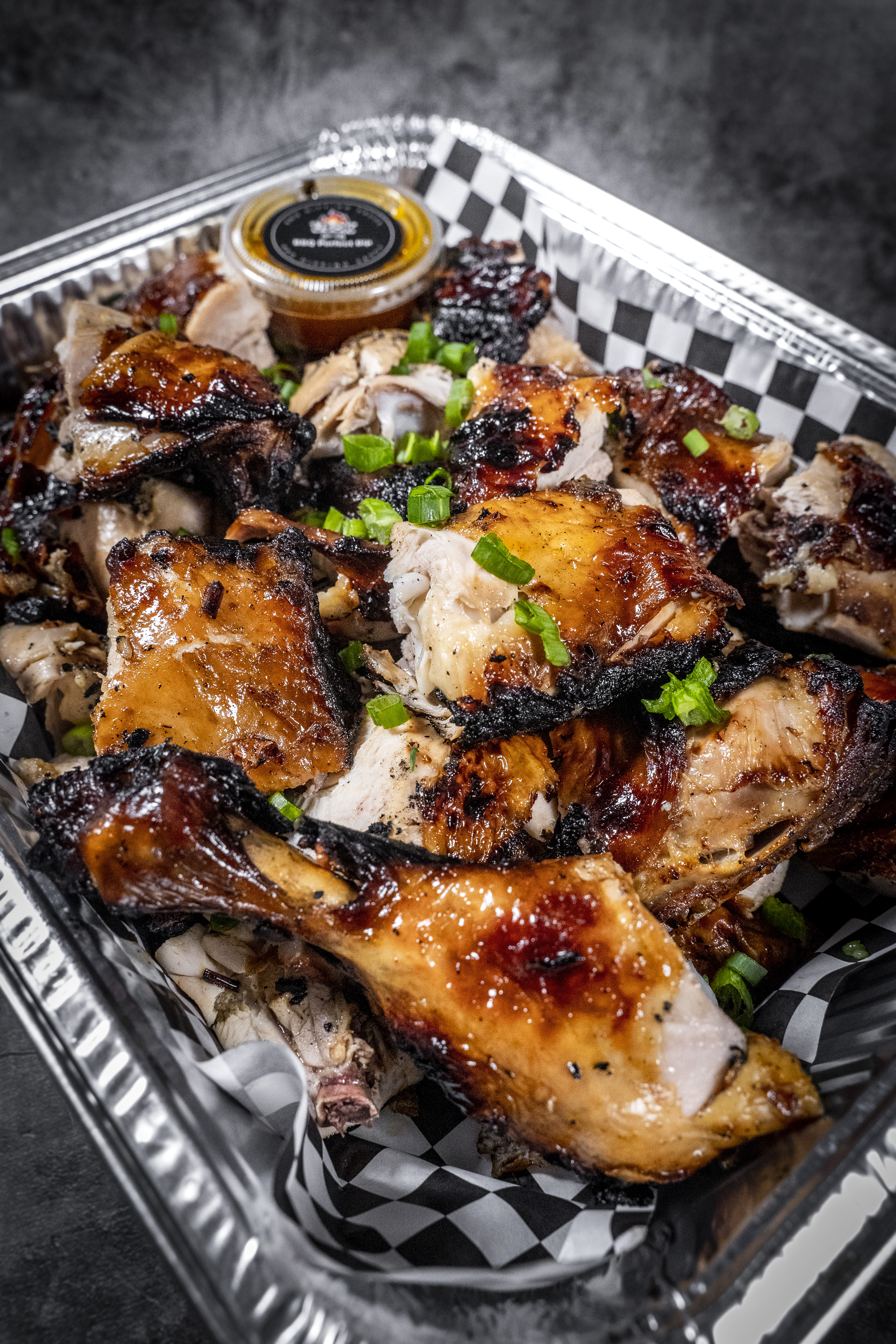 BBQ chicken tray with sauce
