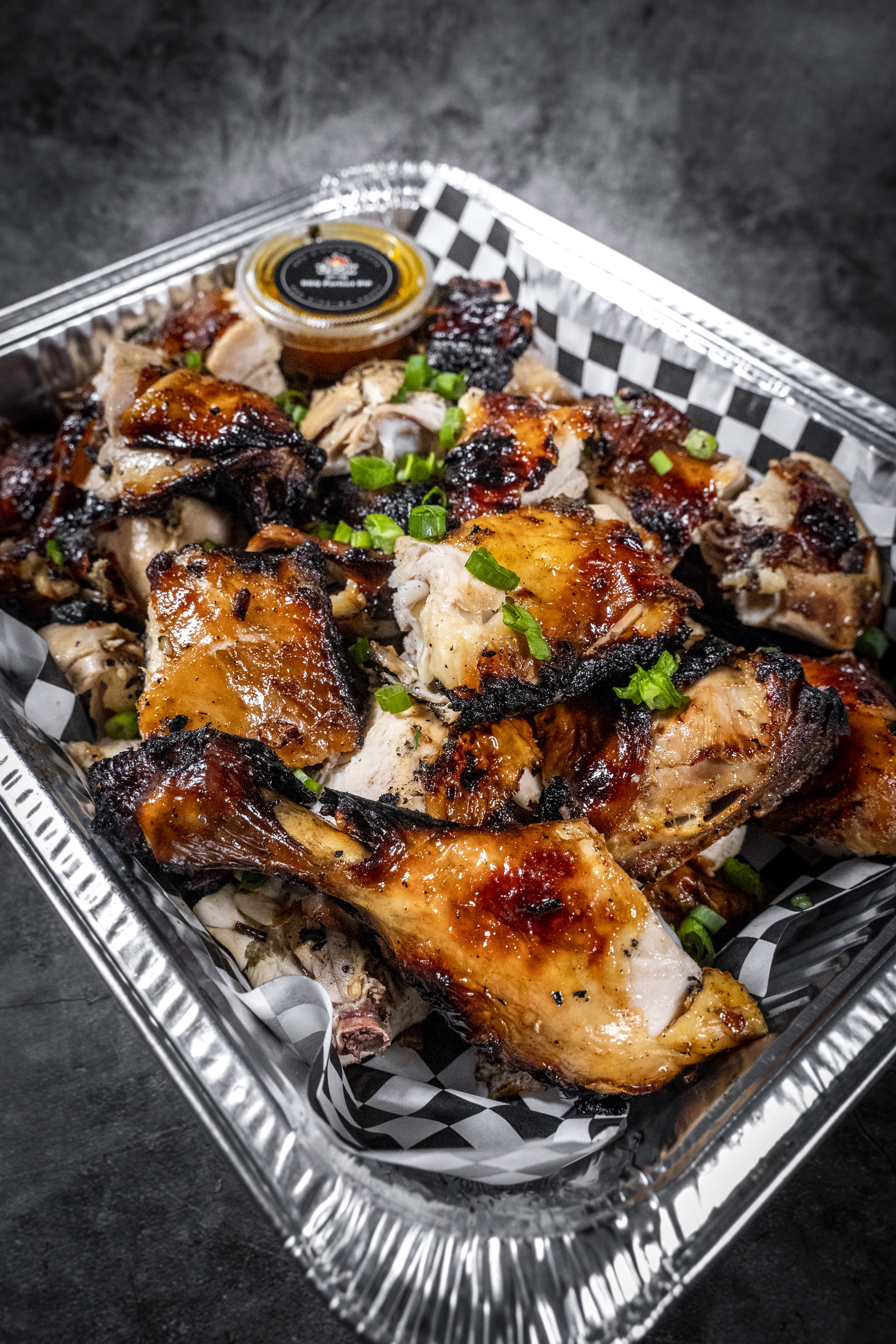 Catering tray of BBQ chicken pieces